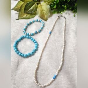 Handmade white and blue beaded necklace and bracelets